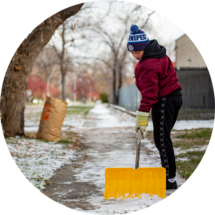 SCA Community Outreach - A Boy is Cleaning the Road