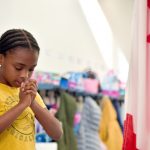 Girl Praying in Springs Christian Academy