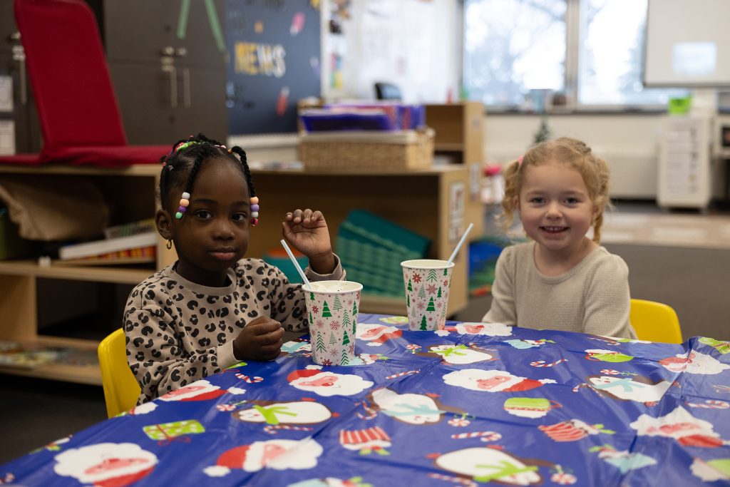 Preschool students having a snack